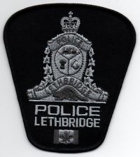 CANADA,ALBERTA,LETHBRIDGE POLICE SUBDUED 1